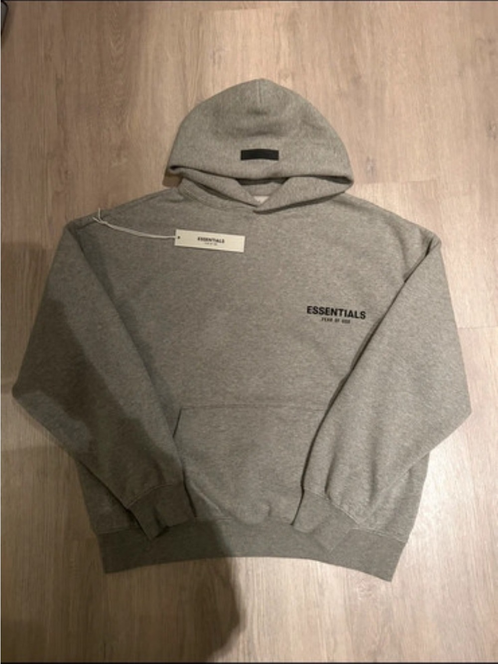 New Essentials Dark Coloured Hoodie with dust Bag